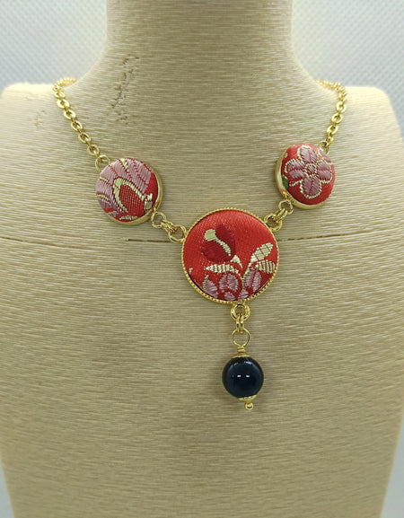 Mariposa girocollo dorato in Broccato