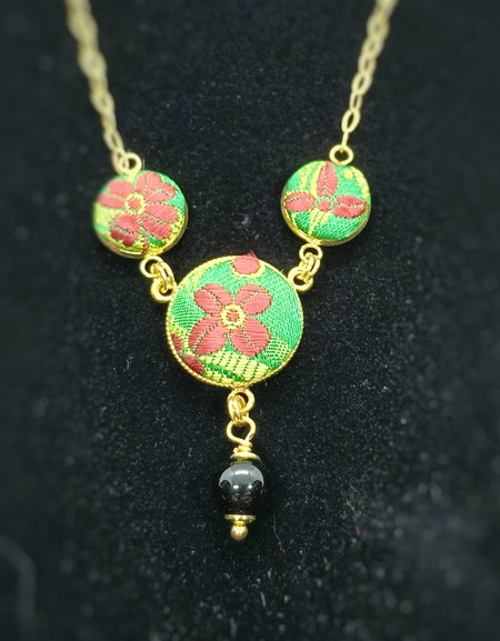 Mariposa girocollo dorato in Broccato